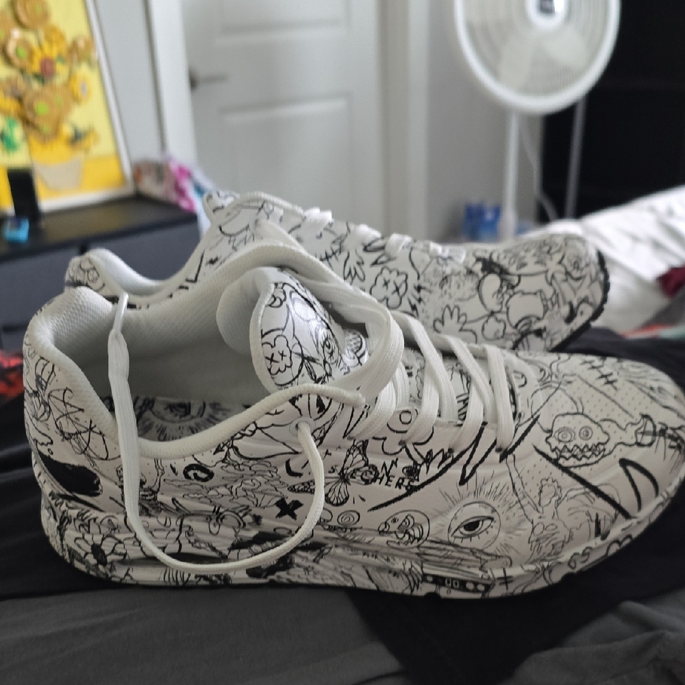 White Sneakers with Black Graphic Design